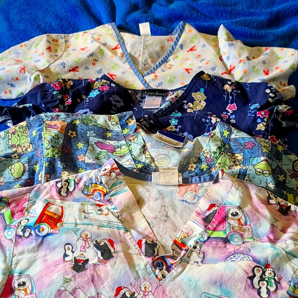 4 small scrub tops.